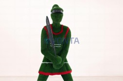 Топиари теннисистка — газон Есо