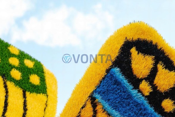 Топиари композиция бабочка на тюльпане — газон Eco