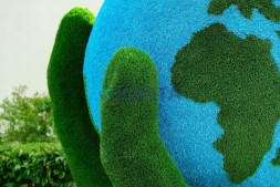 Топиари земной шар в руке — газон Eco