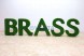 Топиари композиция логотип и буквы BRASS — газон Есо